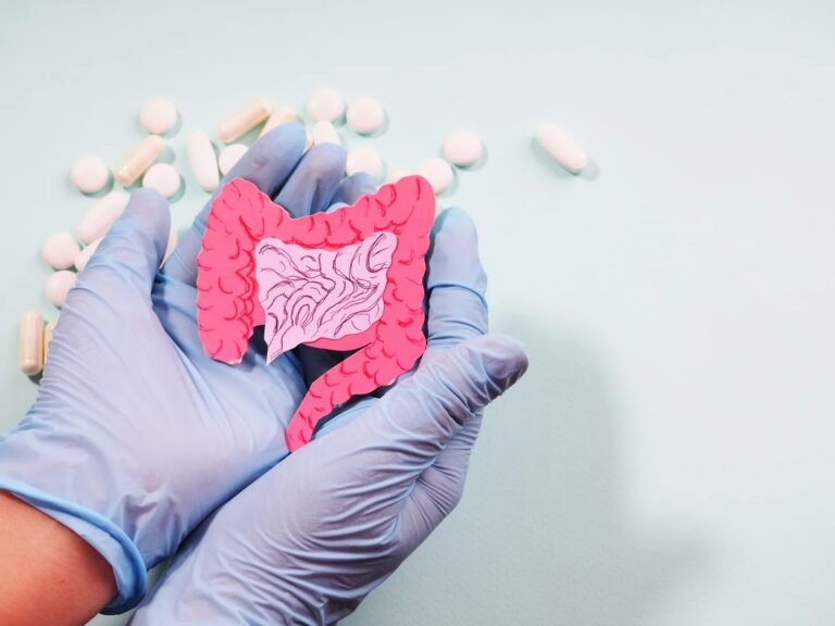 imgi_29_hands-holding-intestine-shape-healthy-bowel-degestion-leaky-gut-probiotics-prebotics-gut-health-colon-gastric-stomach-cancer-concept-scaled