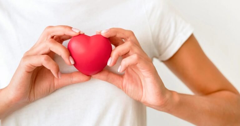 imgi_30_front-view-woman-holding-heart-shape-scaled